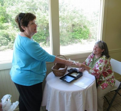 Leslie Monticone demonstrates How a Donation is Made with Karen Lovejoy.